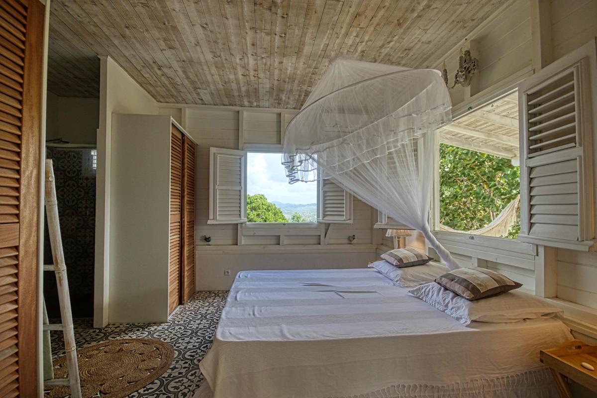 15 Location villa Martinique- Chambre lit